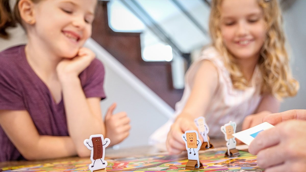 Kids playing board game