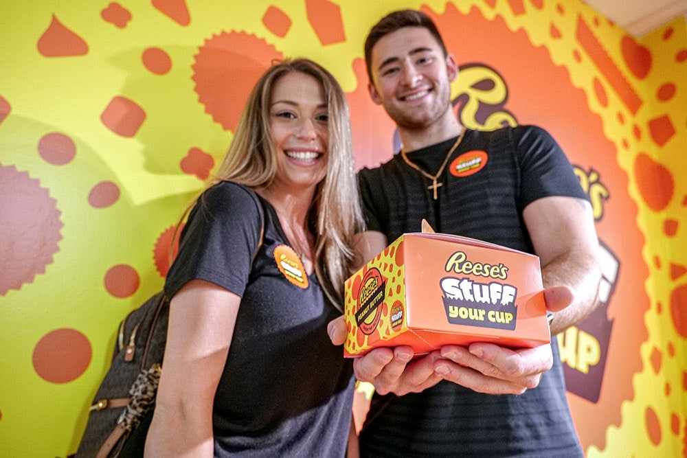 Couple Holding Stuffed Reese's Cup