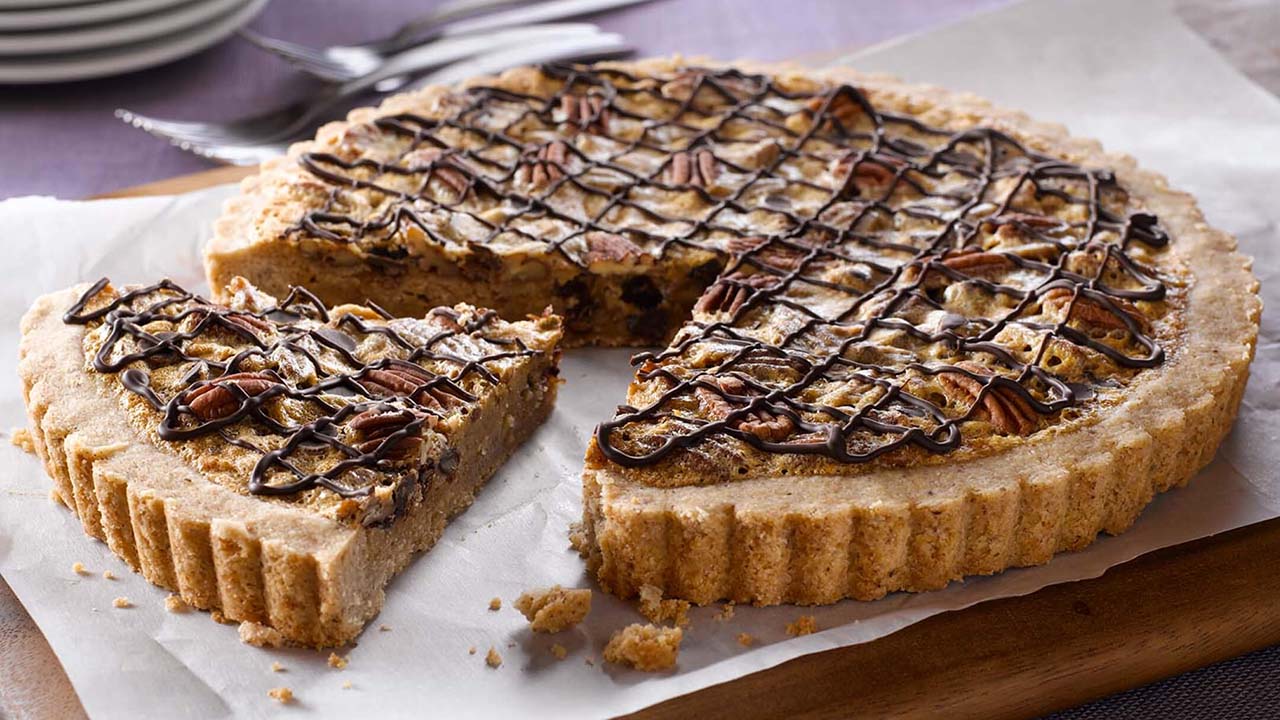 serving slice of hersheys chipits chocolate chip pecan tart